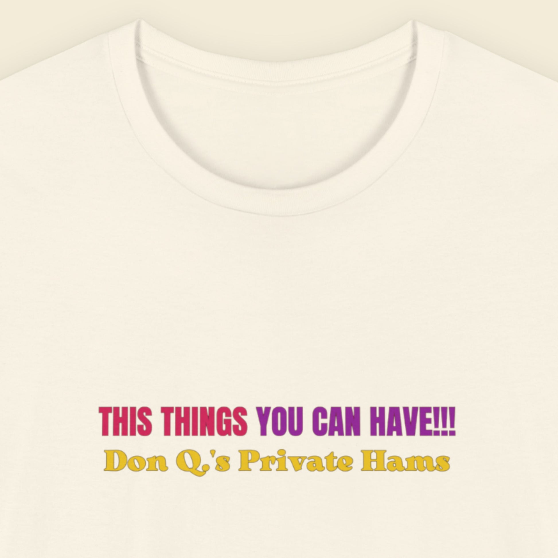 Natural cream colored shirt with multi-colored text