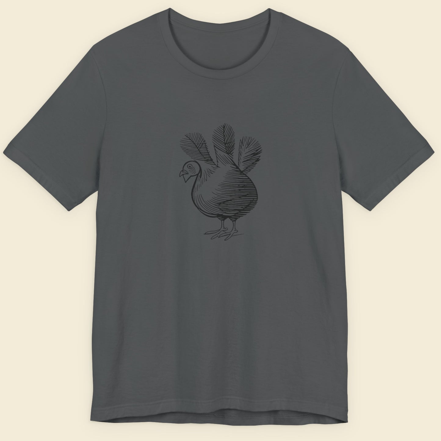 grey shirt with a sketch of a three tailed chicken.