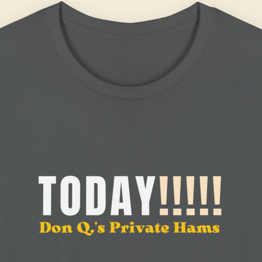 Grey t-shirt with humorous colorful text on a beige background.