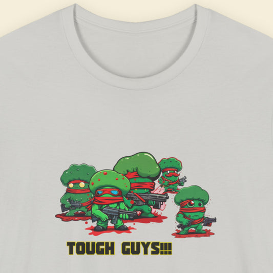 Light grey shirt with a group of Tough Guys cartoon characters and multi-colored text. 