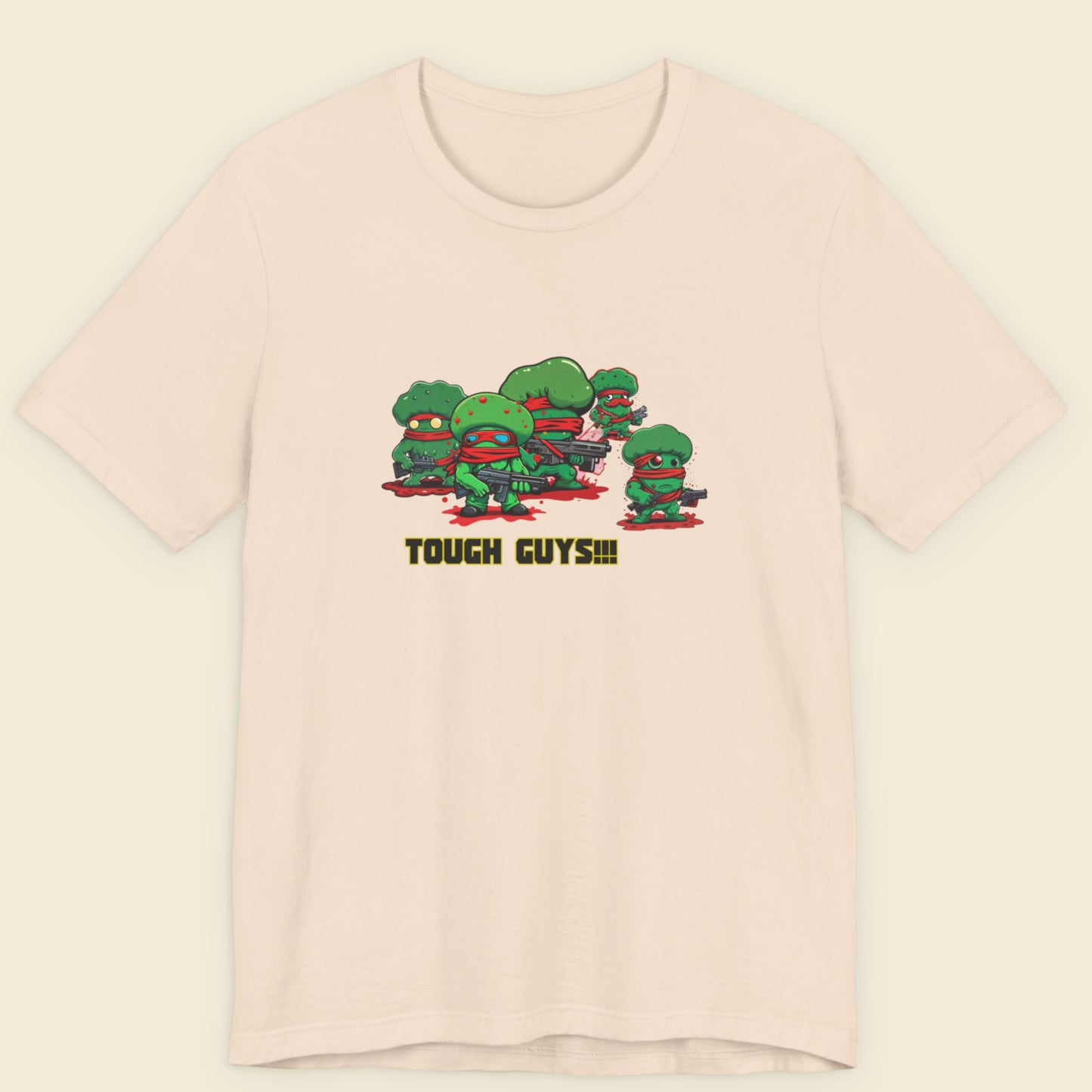 Beige t-shirt with cartoon broccoli and 'Tough Guys!!!' text on a beige background