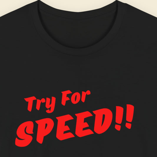 Black t-shirt with red text 'Try For SPEED!!' on a beige background.