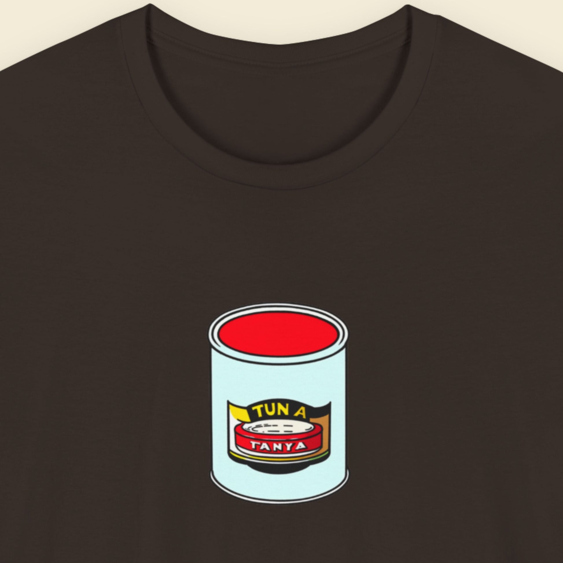 Brown t-shirt with a can of tuna design on a beige background