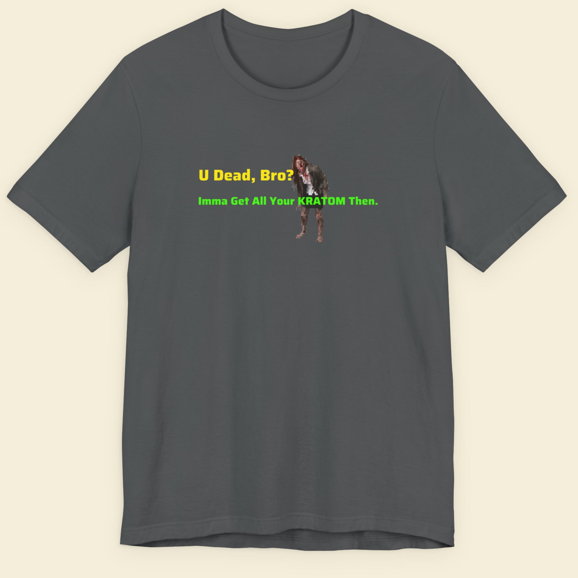 Gray t-shirt with text and graphic on a beige background.