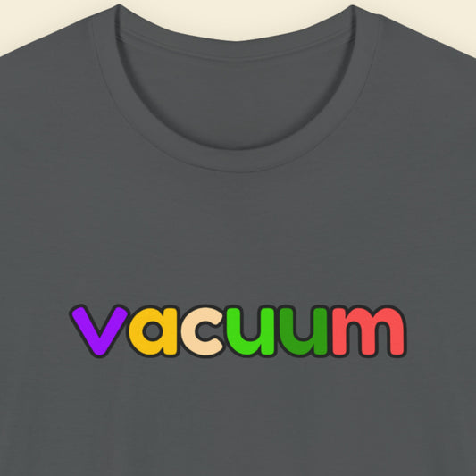 Grey t-shirt with humorous colorful text on a beige background.