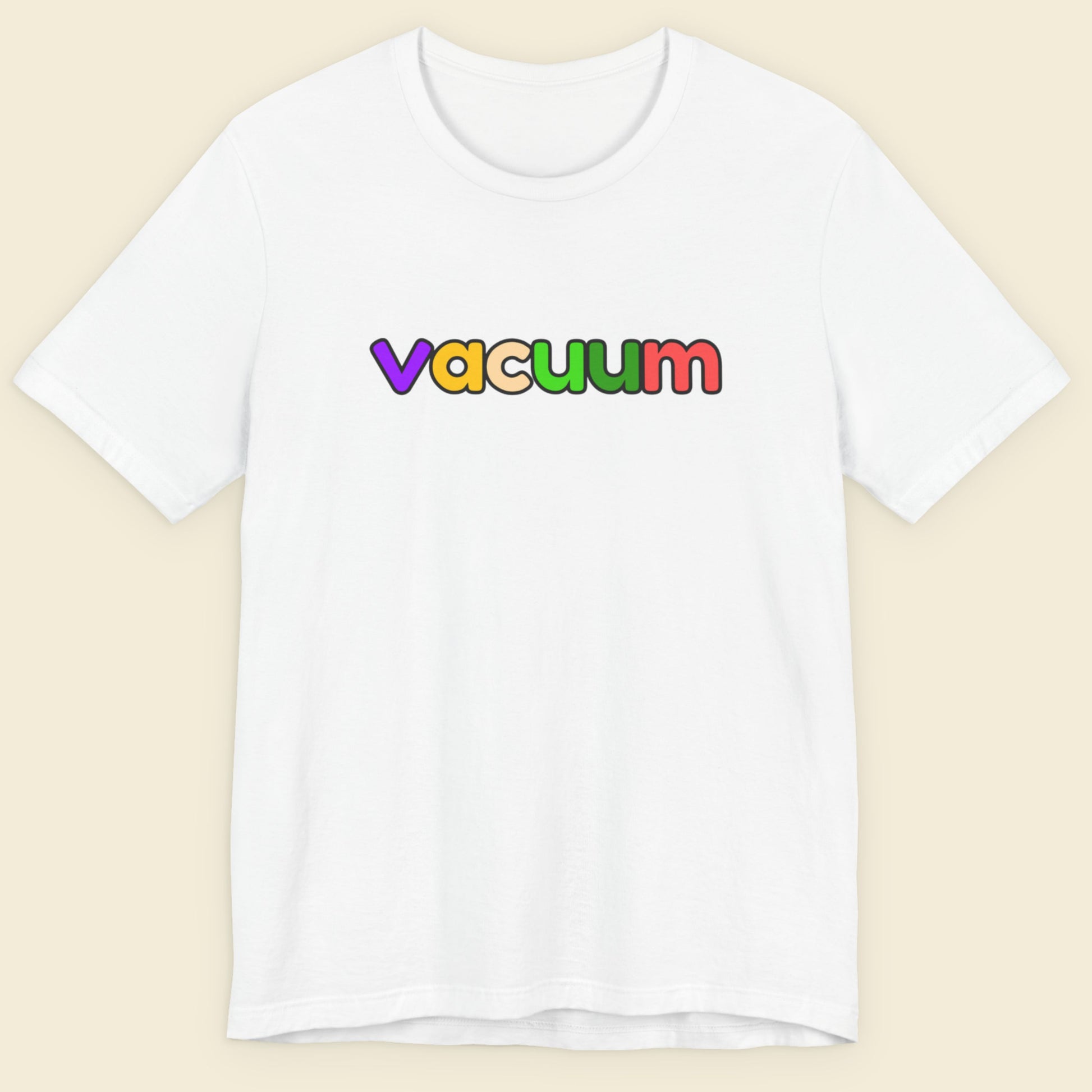 White t-shirt with colorful 'vacuum' text on a beige background.