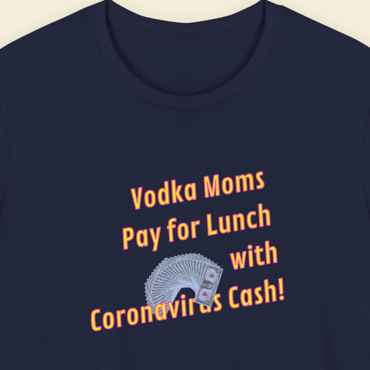 Navy blue t-shirt with humorous text and graphic design on a beige background.