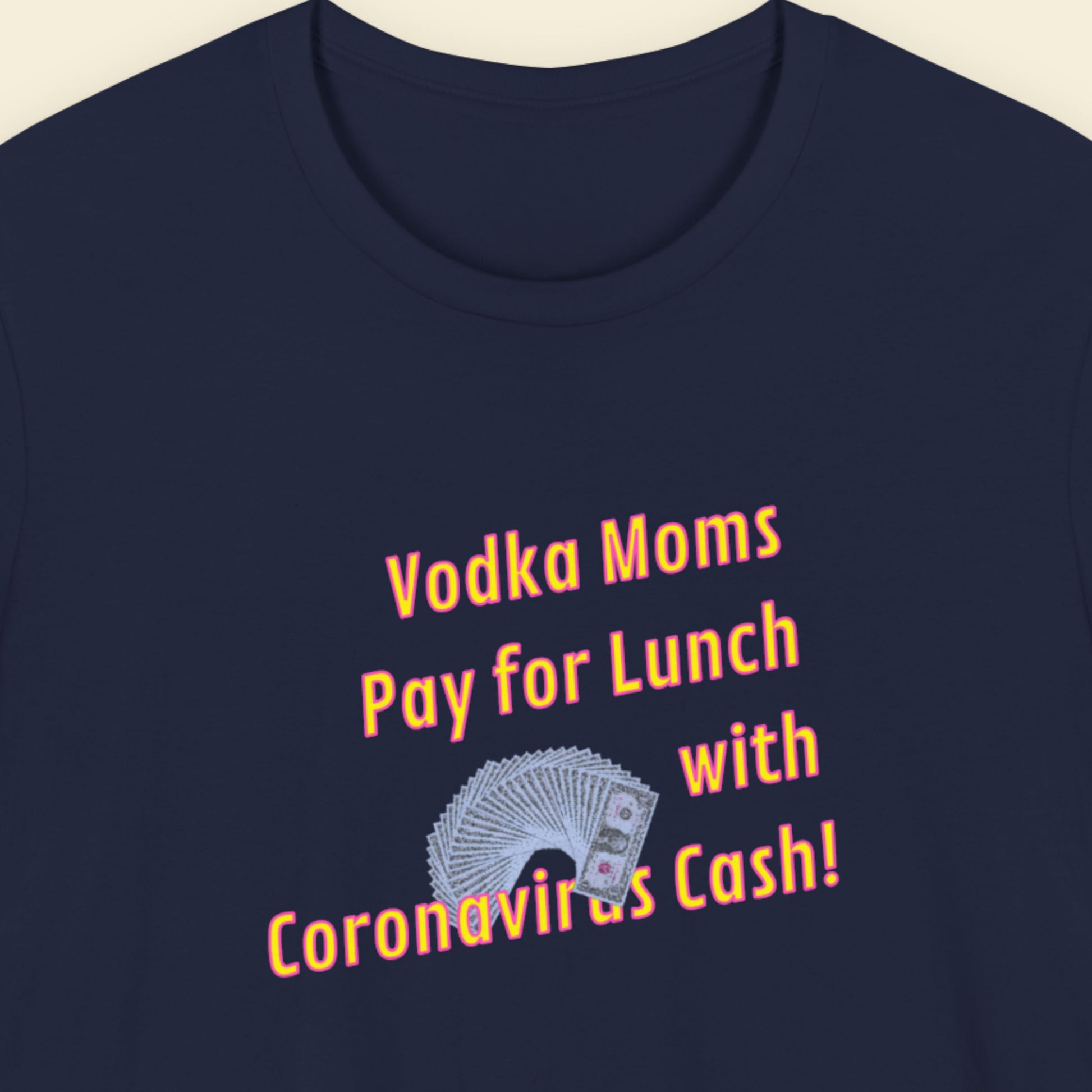 Navy blue t-shirt with humorous text and graphic design on a beige background.