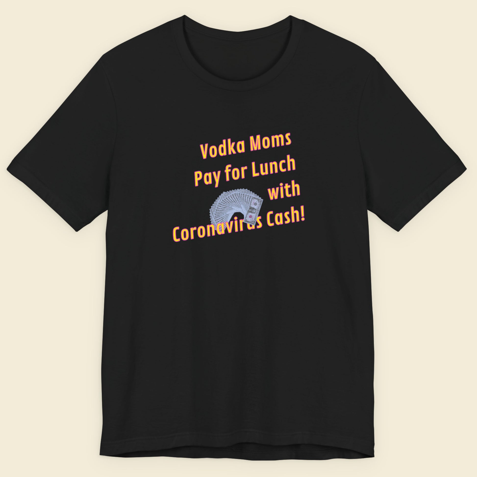 Black t-shirt with humorous text design on a beige background.