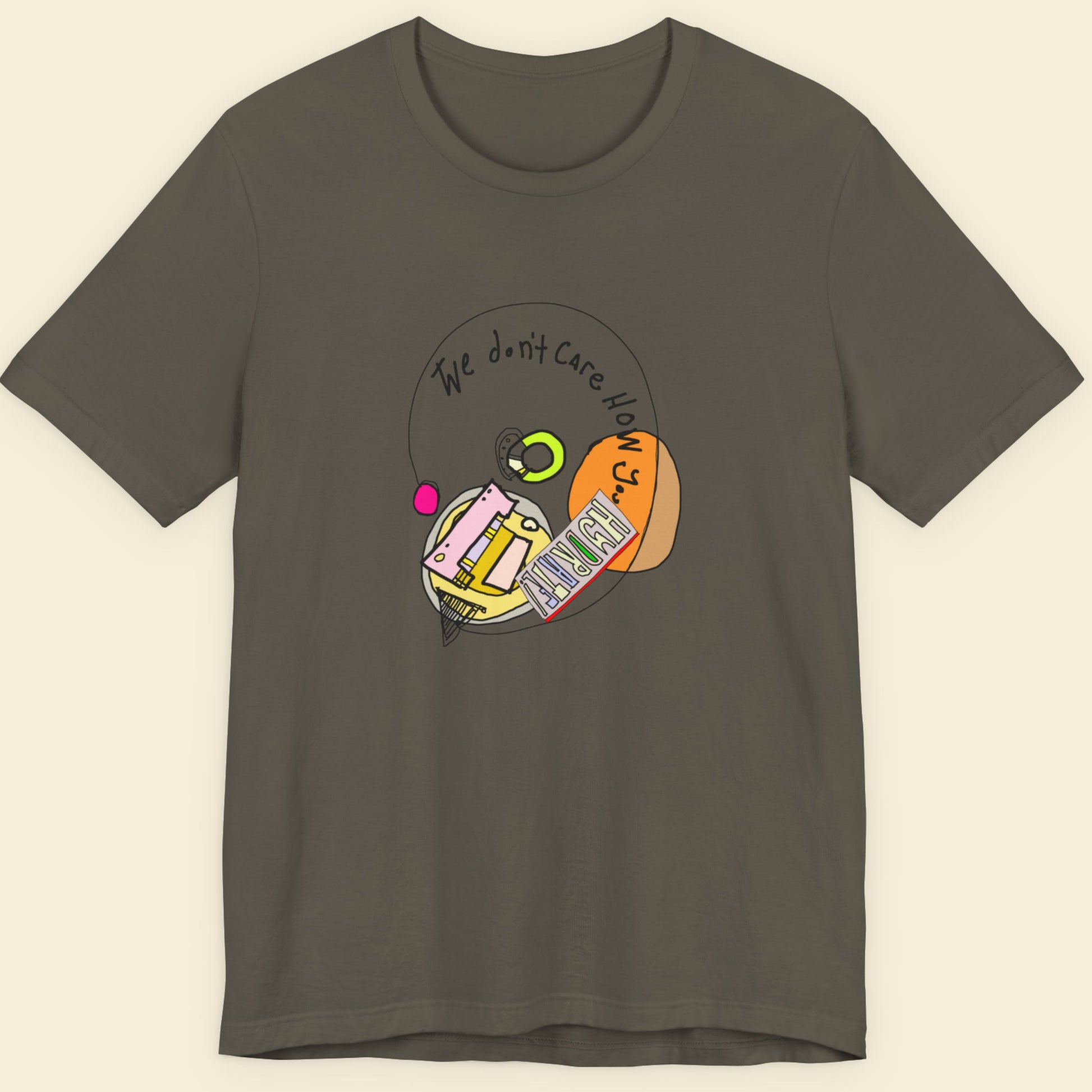 Army green t-shirt with a colorful abstract drawing on a beige background.