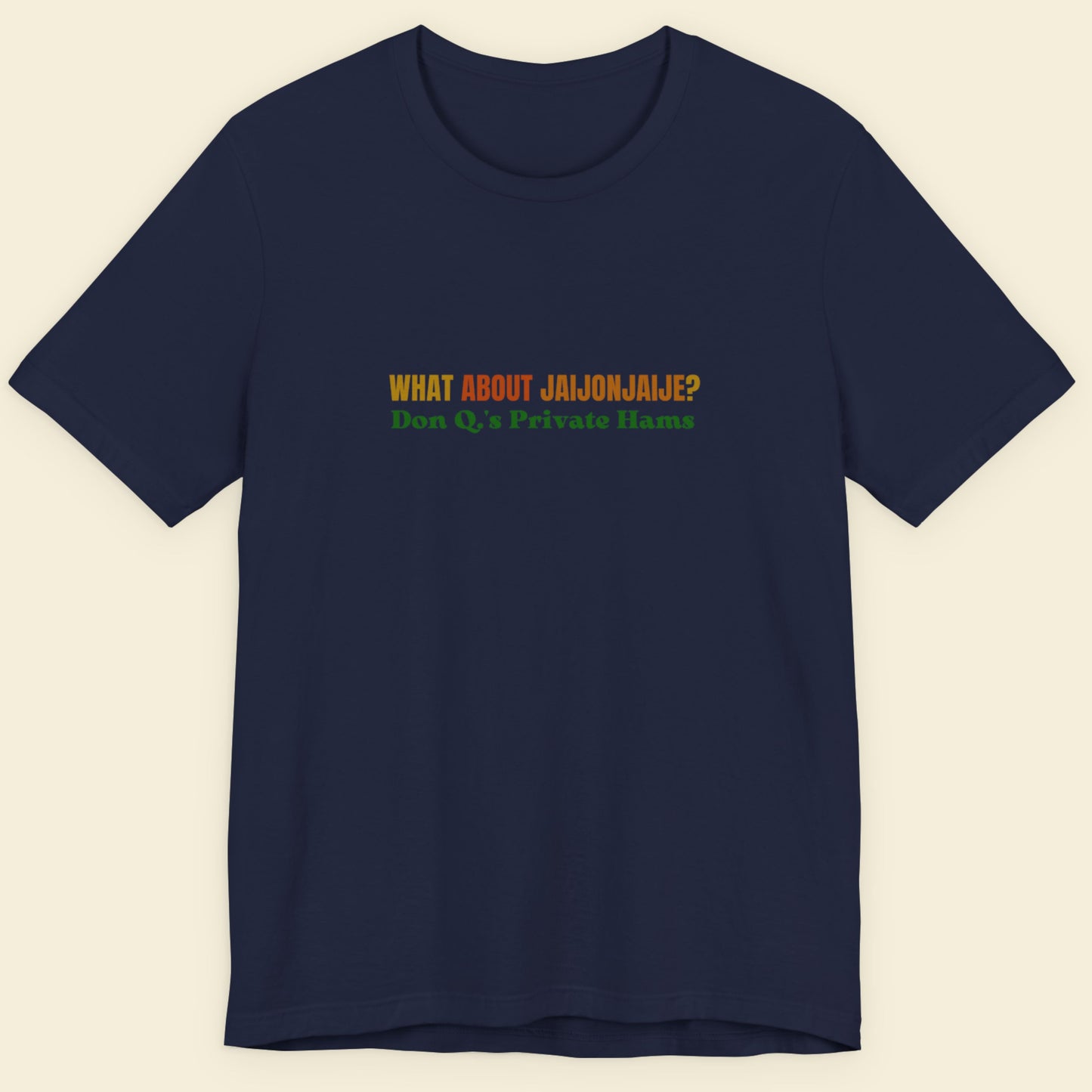 Navy blue t-shirt with colorful text on a beige background
