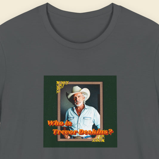 T-shirt with a graphic of a man in a cowboy hat and text 'Who is Trevor Dekkens?' on a dark gray background.