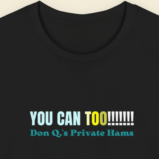 Black t-shirt with humorous colorful text on a beige background.
