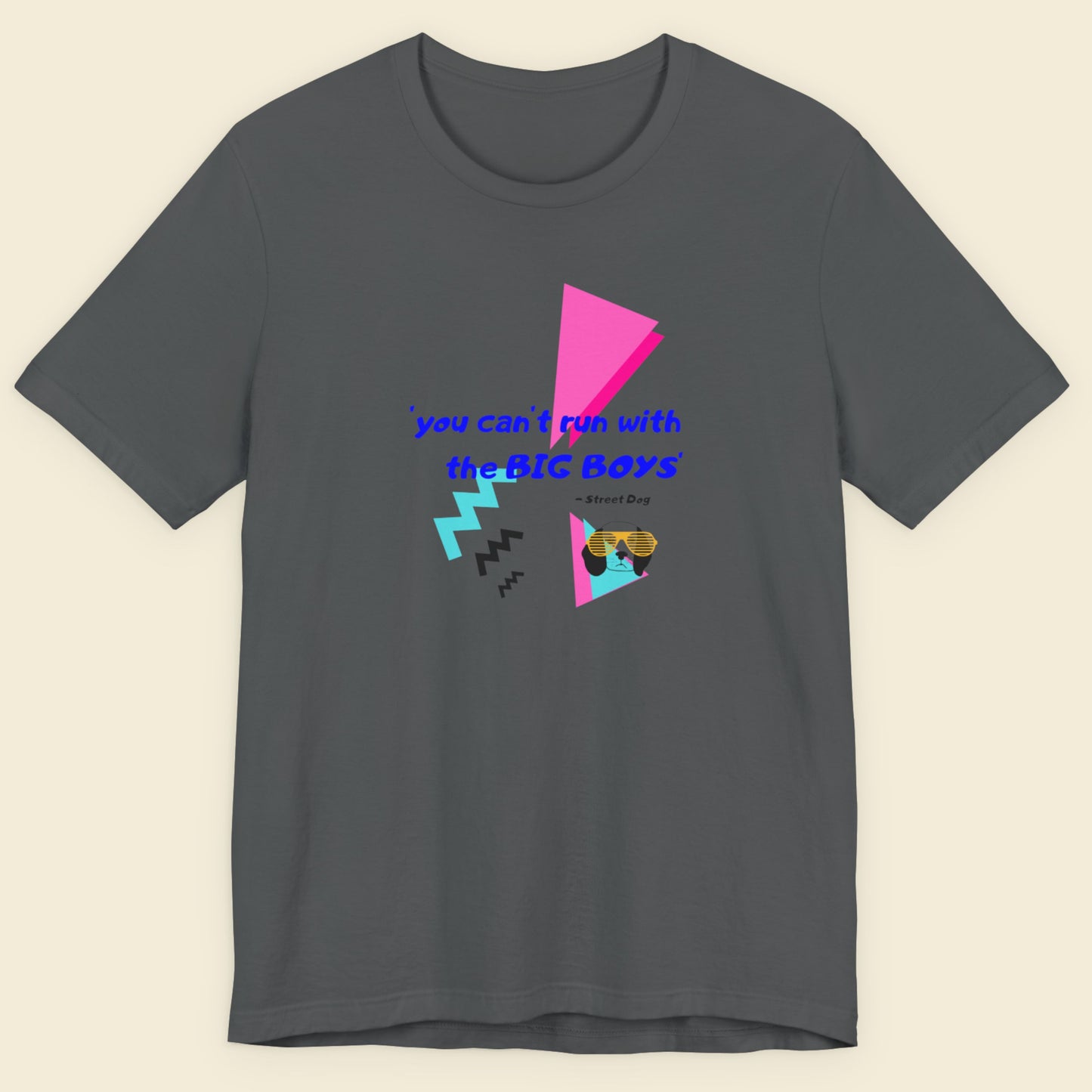 Gray t-shirt with colorful geometric design and text on a beige background.
