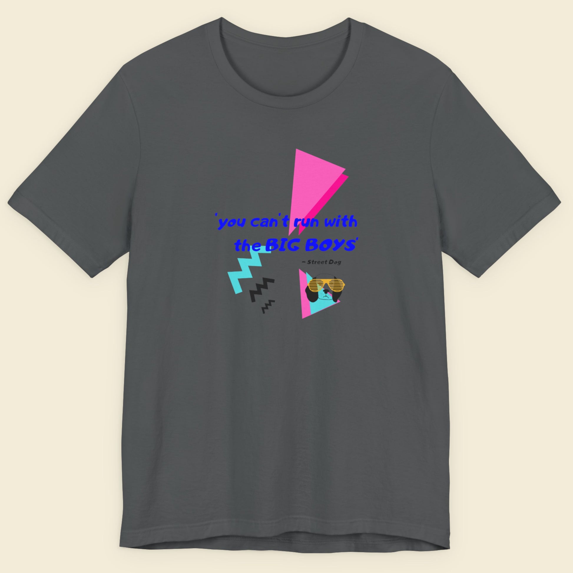 Gray t-shirt with colorful geometric design and text on a beige background.