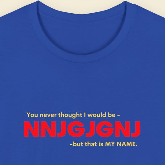 Blue t-shirt with red and yellow text on a beige background.