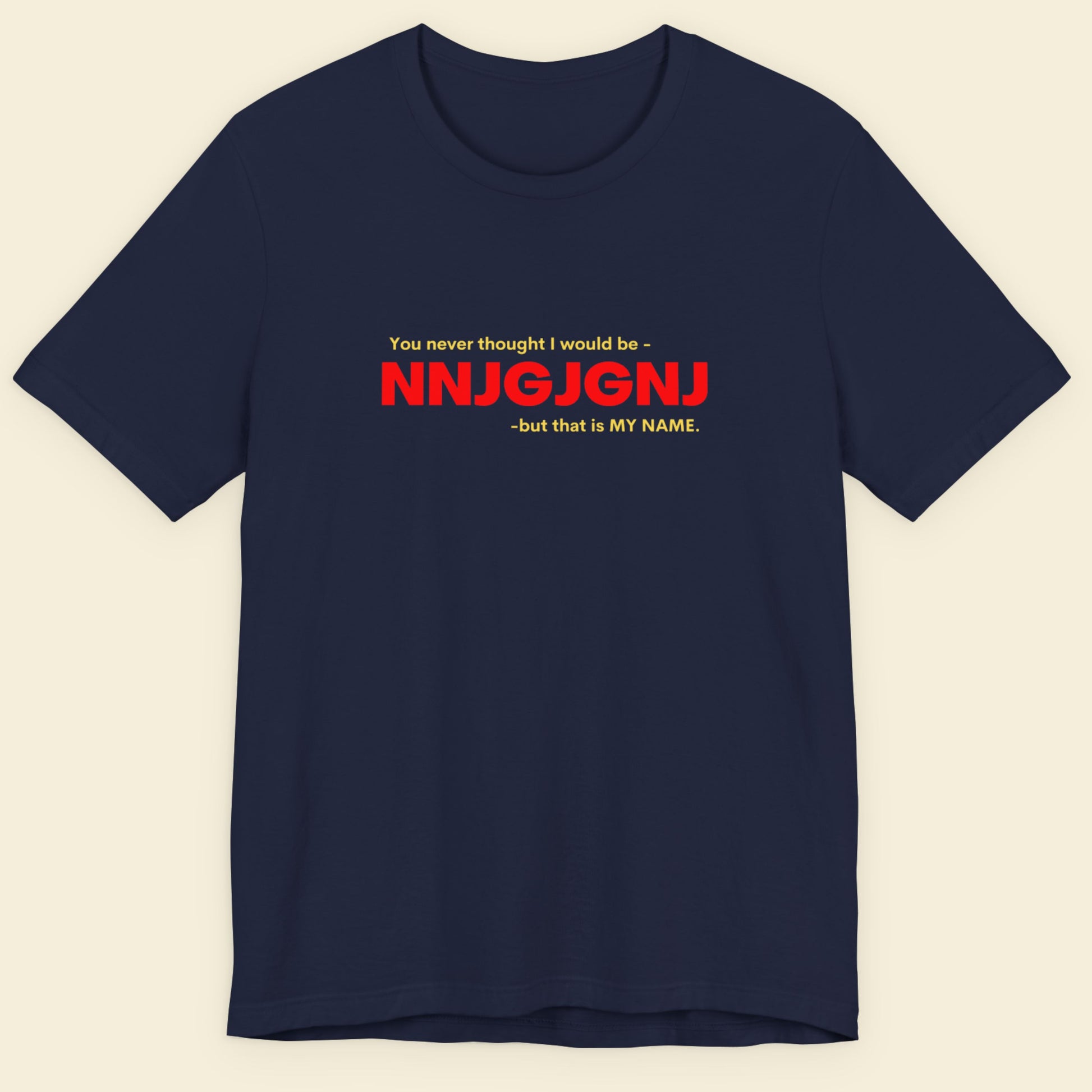 Navy blue t-shirt with red and white text on a beige background.