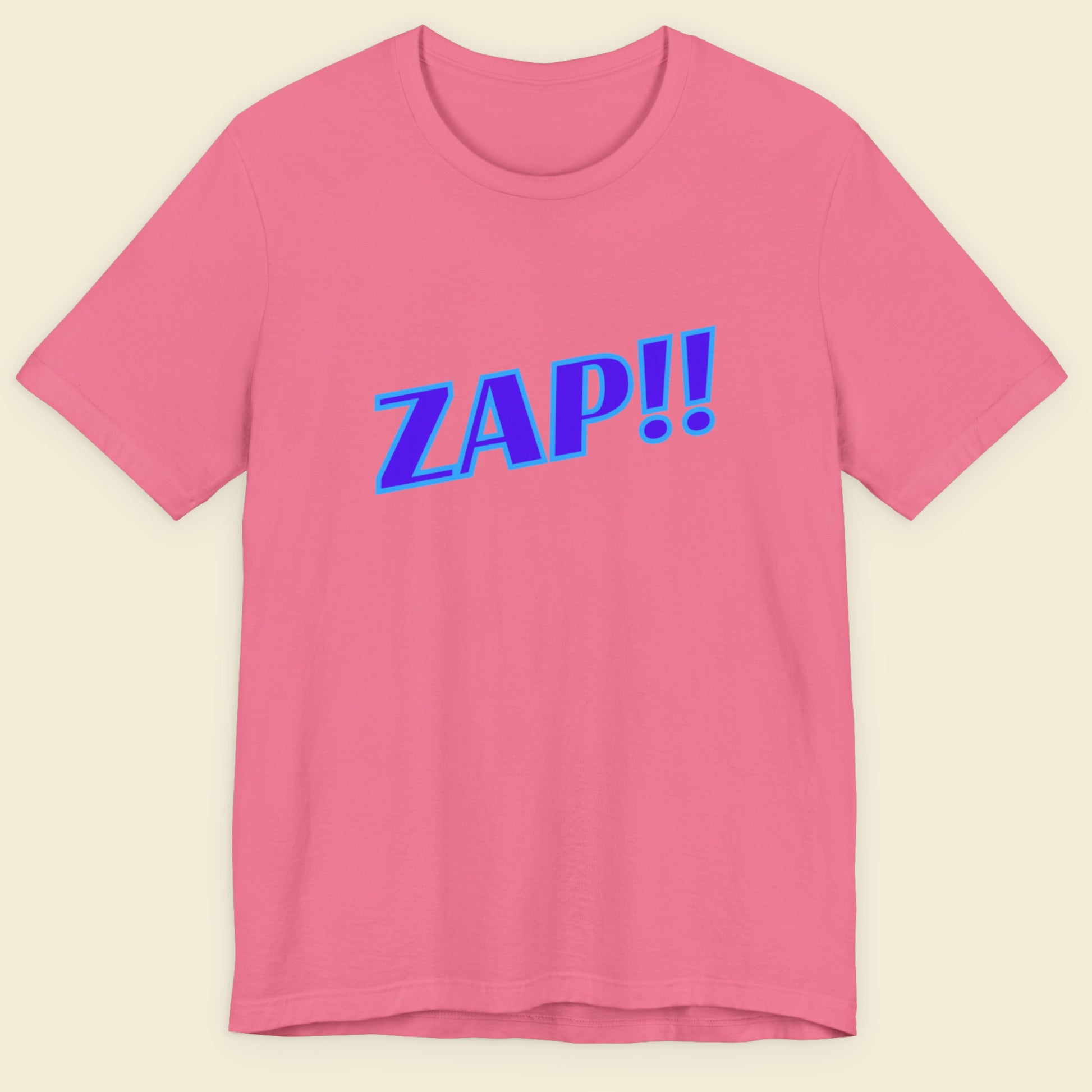 Pink t-shirt with blue 'ZAP!!' text on a beige background.