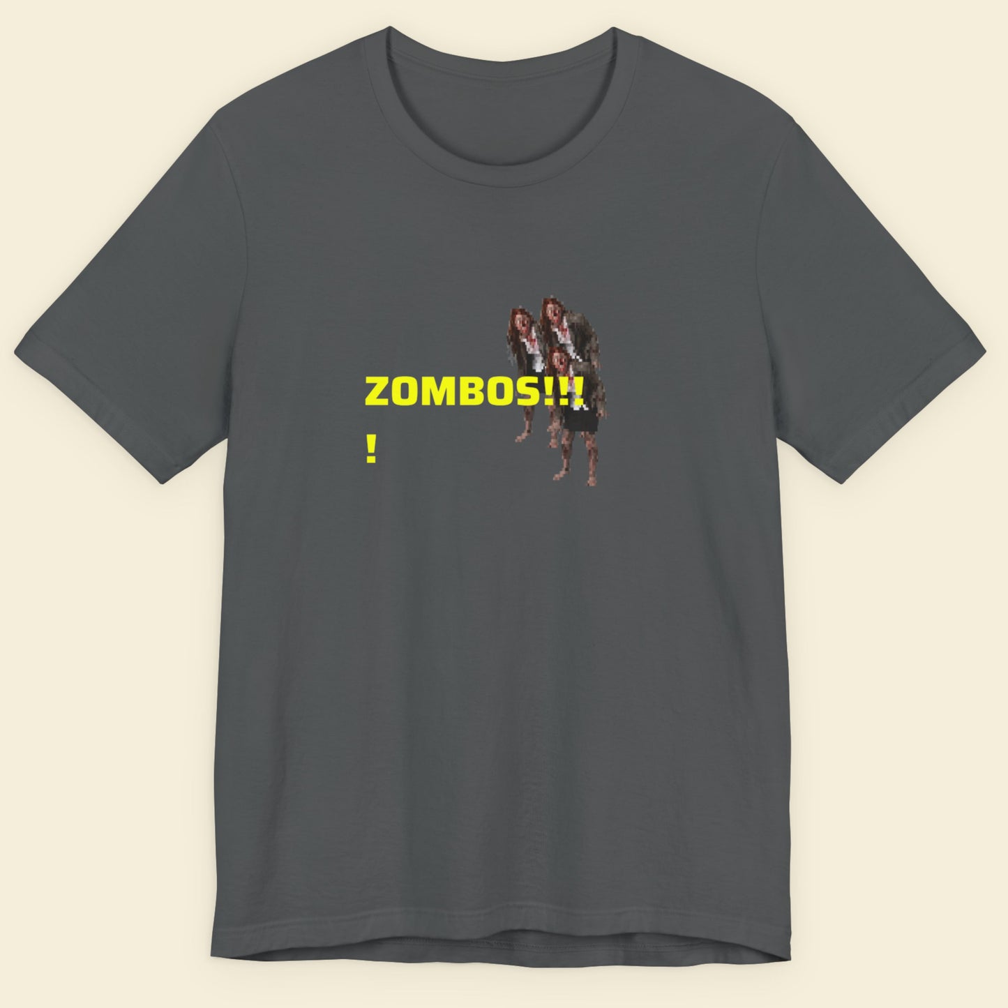 Gray t-shirt with 'ZOMBOS!!!' text and graphic on a beige background.