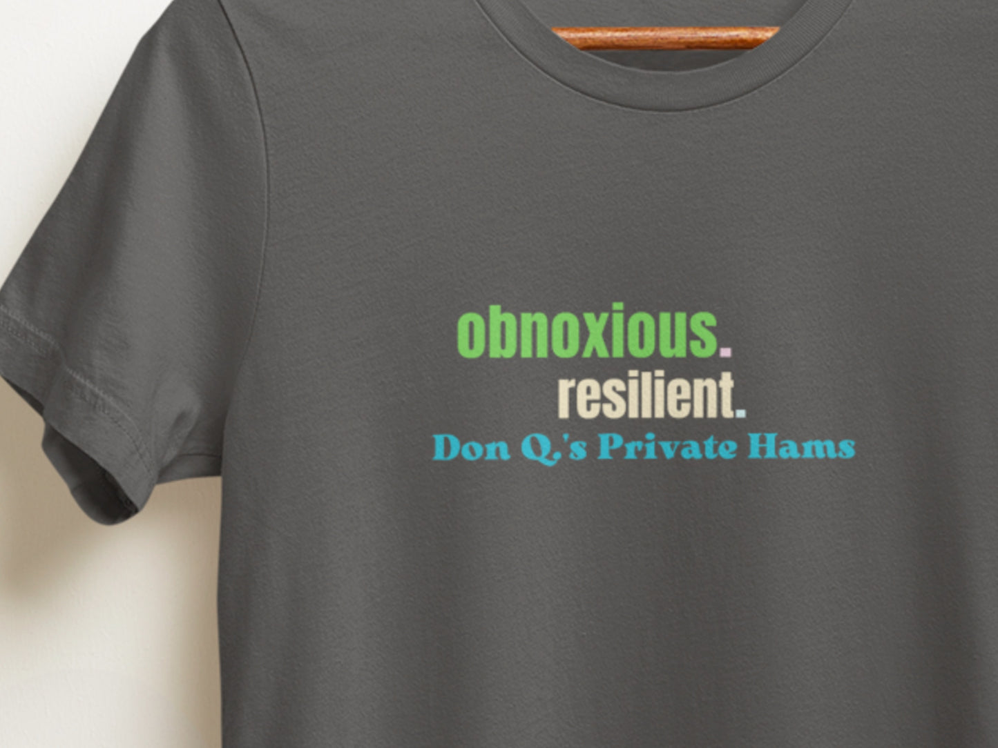 Obnoxious. Resilient., Don Q.s Private Hams Asphalt T-Shirt.