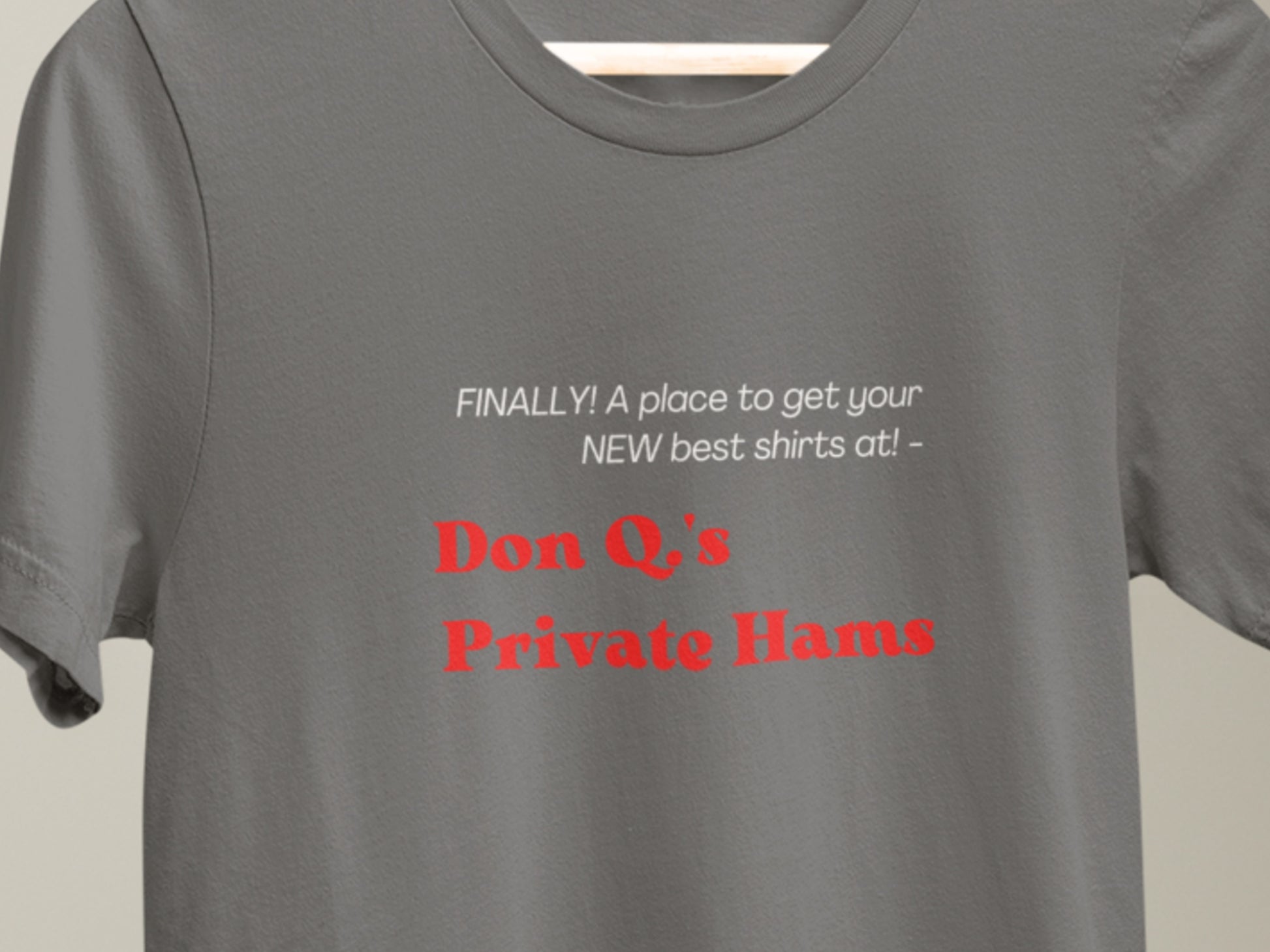 Finally! A Place To Get Your NEW Best Shirts At Don Q.'s Private Hams Asphalt T-Shirt - Red Text.